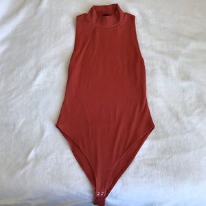 High neck rusty orange bodysuit